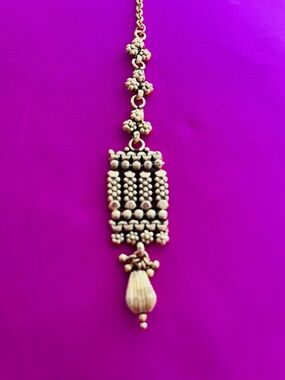 Gold Indian Maangtika that I bought on one of my travels to India